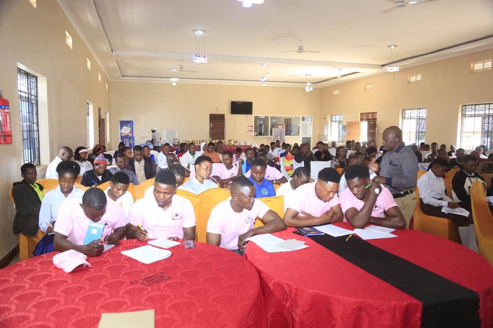 Participants taking notes